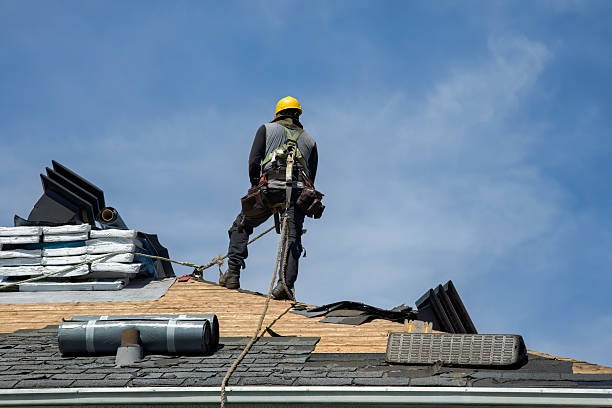 Professional Roof Replacement technician working in Kirkwood, NY